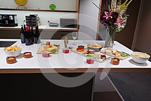 A cheese platter accompanied with wine