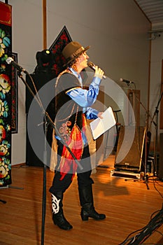 Presenter, compere, master of ceremonies - actor michael smiles on the stage of the country club Giving