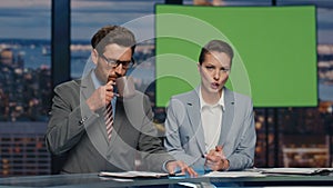 Presenters greenscreen tv studio lighting daily news at evening channel closeup