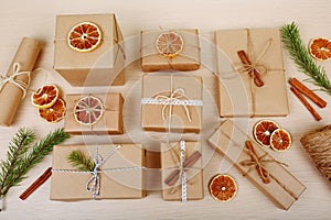 Presents collection laid on a wooden table background with package accessories