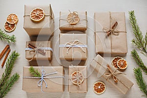 Presents collection laid on a wooden table background with package accessories