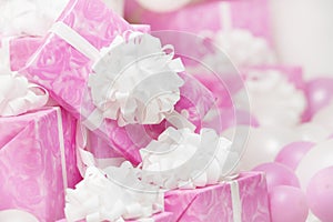 presents gift boxes, pink background for female or woman birthday