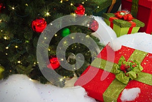 Presents under christmas tree in the snow
