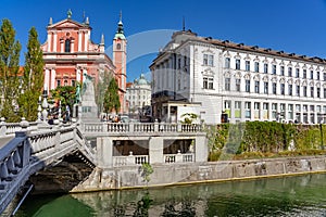 Preseren Square with Tromostovje bridge on Ljubljanica river with Cerkev Marijinega oznanjenja church