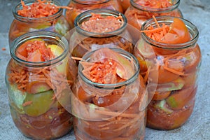 Preservation. Blanks for the winter. Marinated. Red and yellow tomatoes in jars