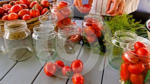 Preservation tomatoes in jars. Selective focus.