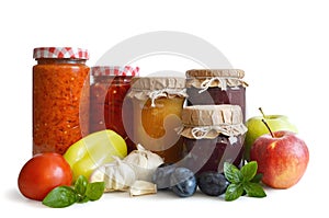 Preserved food in the jars isolated on white