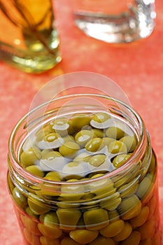 Preserved green peas in jar photo