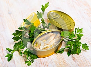 Preserved natural ensis with herbs and lemon