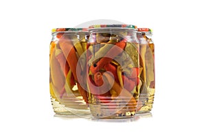 Preserved Pickled Chilli Peppers in Glass Jars on White Background