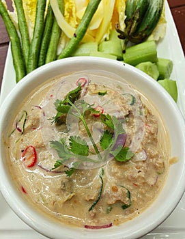 Preserved soy bean dip. Thai Soy Bean Dipping Sauce Tao Jiew Lon in a white cup.