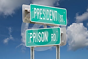President Street, Prison Road Intersection Sign Representing Political Corruption photo