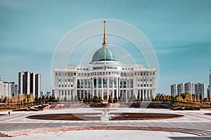 Presidential palace `Ak-Orda` with blue sky across river in Astana, Kazakhstan photo