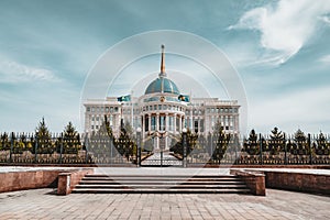 Presidential palace `Ak-Orda` with blue sky across river in Astana, Kazakhstan