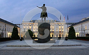 Presidential Palace in the evening illumination, silhouette of equestrian statue of Prince Jozef Poniatowski, Warsaw, Poland