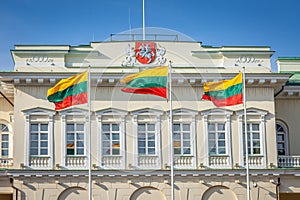 Presidential Palace in Vilnius and Lithuanian flags at sunny day, Lithuania