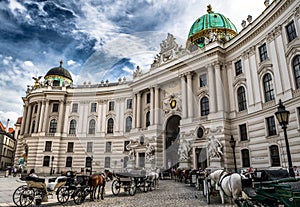 Presidents Residence, Wiener Hofburg, With Fiaker Horses And Coaches In The Inner City Of Vienna In Austria