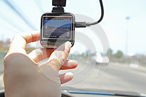 Press the button of front camera car recorder