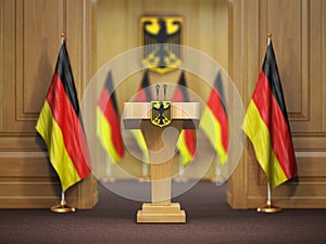 Press conference or briefing of premier minister of Germany concept,. Podium speaker tribune with Germany flags and coat arms.