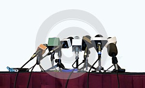 Press conference microphones over white