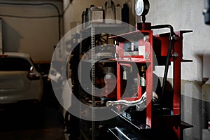 Press machine view inside of automobile repair service workshop