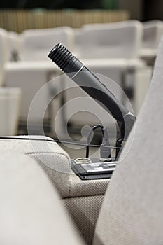 Press microphone in a conference room