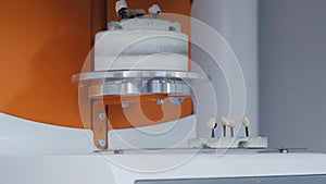 Press oven machine for denture production in the stomatology laboratory.