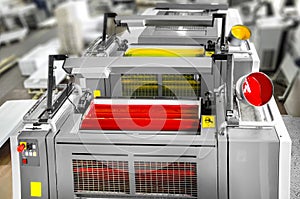 Press printing - Offset machine detail. Magenta and yellow units