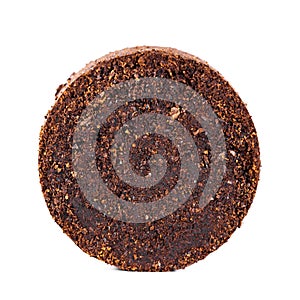 Pressed coffee grounds isolated against white background