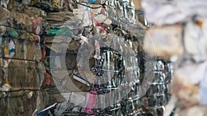 Pressed garbage at a waste recycling plant, close up.