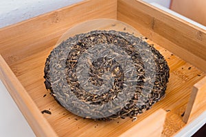 Pressed Pu-erh tea cake from Yunnan province, China