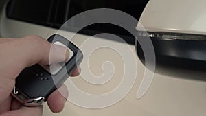 Pressing the button of the car key and the lights blink when door open or closed