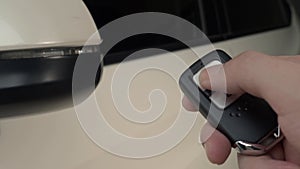 Pressing the button of the car key and the lights blink when door open or closed