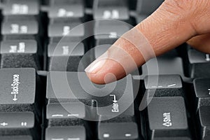 Pressing entre key on computer keyboard