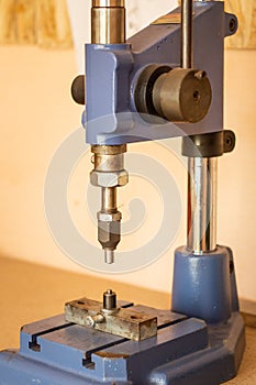 Pressing machine in clothes and accessories manufacture. Clench