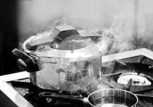 Pressure cooker steam over cooking in a Kitchen