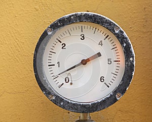 pressure gauge manometr on brown background
