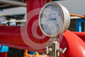 Pressure gauge measuring instrument close up on pneumatic control system