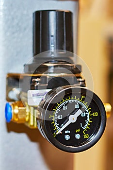 pressure gauge of the pneumatic regulator with blurred background