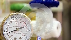 Pressure gauge on refrigerating device