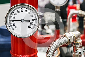 Pressure gauges for visual monitoring of pressure in water supply