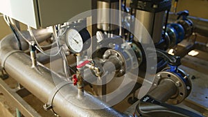 Pressure sensor in an industrial boiler room. Barometer in the heating system. Close-up.