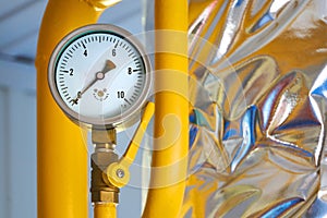 Pressure sensors on the gas pipeline painted in yellow