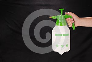 Pressure sprayer bottle in hand