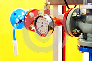 Pressure and temperature sensor in the hot water system. Fragment of a modern boiler room close-up