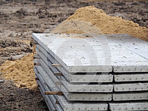 Prestressed Floor planks stacked for construction. It is a slab of reinforced concrete. Put together Structural Topping concrete