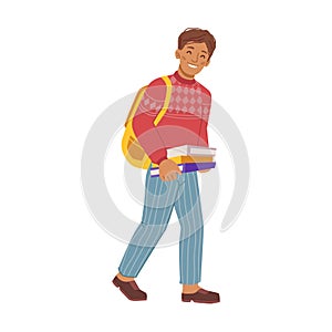 Preteen boy with books and satchel on shoulders