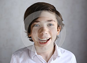 Preteen boy laughing smiling portrait