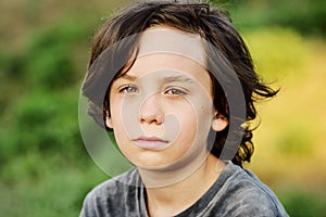 Preteen boy with long hair