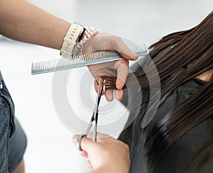 Preteen girl during haircut